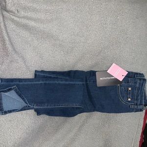 Mid blue wash side split skinny jeans in size 2.
